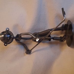 Iron, nuts and bolts Hockey player figurine